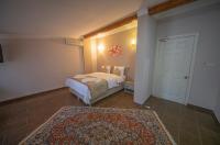 Postel nebo postele na pokoji v ubytování Ağva Carpediem Otel