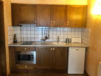 Kuchyňa alebo kuchynka v ubytovaní Apartaments Alzina