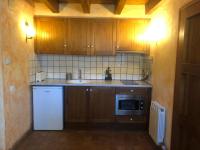 Kuchyňa alebo kuchynka v ubytovaní Apartaments Alzina