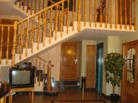 A television and/or entertainment centre at Hostal Universal