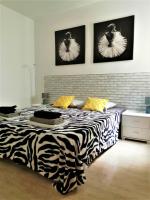 Posteľ alebo postele v izbe v ubytovaní Unigue Design Apartment, Gandia