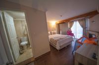 Postel nebo postele na pokoji v ubytování Ağva Carpediem Otel