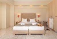 Posteľ alebo postele v izbe v ubytovaní Marilena Hotel