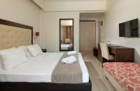 Posteľ alebo postele v izbe v ubytovaní Marilena Hotel