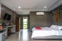 Ein Bett oder Betten in einem Zimmer der Unterkunft Chomview Resort