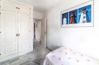 A bed or beds in a room at Residencial Las Redes - 19