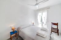 A bed or beds in a room at Residencial Las Redes - 19