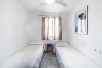 A bed or beds in a room at Residencial Las Redes - 19