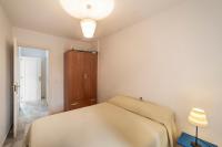 A bed or beds in a room at Residencial Las Redes - 19