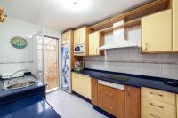 A kitchen or kitchenette at Residencial Las Redes - 19