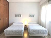 Postel nebo postele na pokoji v ubytování Apartamentos Turísticos La Mundial