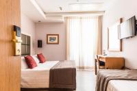 A bed or beds in a room at Vibe Nazionale