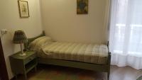 A bed or beds in a room at Riviera 34