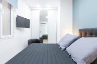 Postel nebo postele na pokoji v ubytování Plaza Mayor Apartment