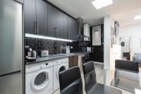 Kuchyň nebo kuchyňský kout v ubytování Plaza Mayor Apartment