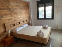 Postel nebo postele na pokoji v ubytování Apartamento Aqua Vitae