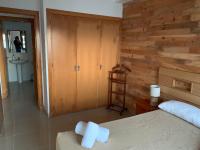 Postel nebo postele na pokoji v ubytování Apartamento Aqua Vitae