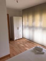 Posteľ alebo postele v izbe v ubytovaní Apartamentos Centro Malaga