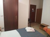Posteľ alebo postele v izbe v ubytovaní La Casa Dei Sogni