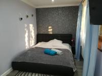 Posteľ alebo postele v izbe v ubytovaní Apartamenty Kletówka