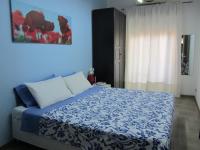 Łóżko lub łóżka w pokoju w obiekcie B&B Mare di Augusta La Finestra sul Porto
