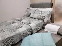 Reese @ Sea Residences Manilaにあるベッド