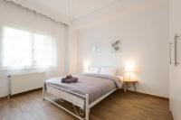 Posteľ alebo postele v izbe v ubytovaní Saint Dimitrios Central Apartment 100sqm.