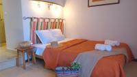 Cama ou camas em um quarto em VVF Luberon Provence