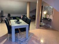 Posezení v ubytování Apartmani Sunset