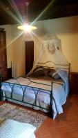 A bed or beds in a room at Posto del Sole