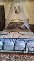 A bed or beds in a room at Posto del Sole