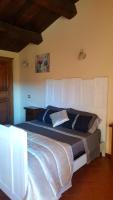 A bed or beds in a room at Posto del Sole
