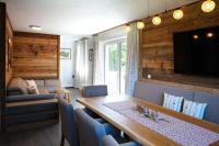 A seating area at Alp-IN Lodges Kaprun