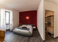 A bed or beds in a room at Home in Orvieto - corso Cavour 138