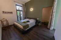 A bed or beds in a room at Home in Orvieto - corso Cavour 138