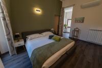 A bed or beds in a room at Home in Orvieto - corso Cavour 138