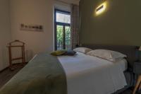 A bed or beds in a room at Home in Orvieto - corso Cavour 138
