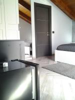 Posteľ alebo postele v izbe v ubytovaní THE ATTIC ROOM