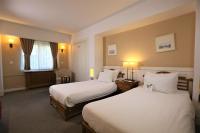 Postel nebo postele na pokoji v ubytování Dedeman Palandoken Ski Lodge Hotel