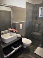 Kúpeľňa v ubytovaní Apartments Jaki
