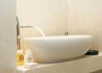 Kúpeľňa v ubytovaní Esperia Luxury Suites