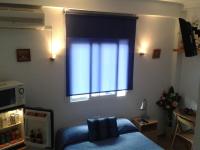 Posteľ alebo postele v izbe v ubytovaní Hostal Arneva Orihuela