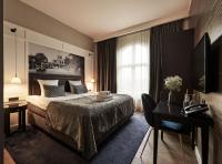 Postel nebo postele na pokoji v ubytování Ascot Hotel