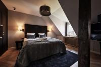 Postel nebo postele na pokoji v ubytování Ascot Hotel