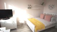 Łóżko lub łóżka w pokoju w obiekcie Bagno 7 City centre