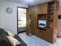 A television and/or entertainment centre at a casa mia holiday rental