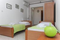 Posteľ alebo postele v izbe v ubytovaní Apartments Villa Alex