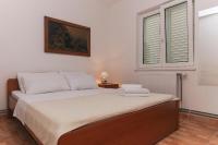 Posteľ alebo postele v izbe v ubytovaní Apartments Villa Alex