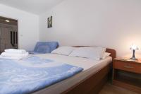 Posteľ alebo postele v izbe v ubytovaní Apartments Villa Alex