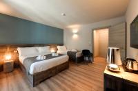 Posteľ alebo postele v izbe v ubytovaní Du Parc Hotel